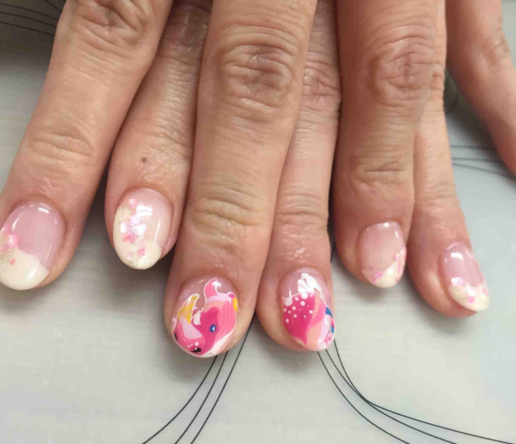 ピンクのサイの桜ネイル